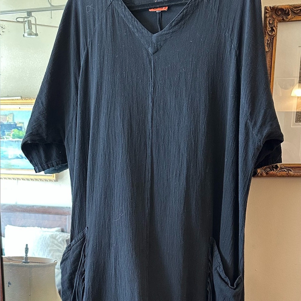 Cool dress for summer. Gauze, worn once, perfect. Short sleeves, pockets.